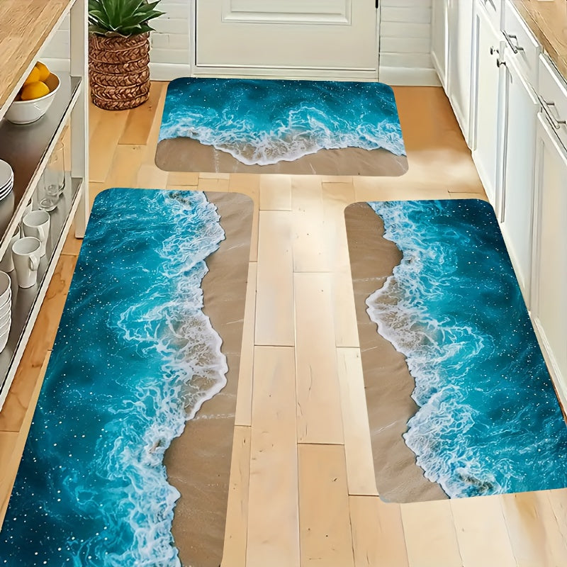 Ocean Bliss Mat featuring turquoise ocean waves and sandy beach design on three anti-fatigue kitchen mats in modern kitchen setting