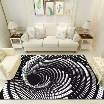 Optical Illusion Rug featuring black and white spiral vortex design in modern living room with white furniture and botanical art