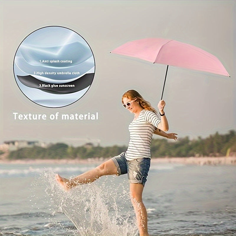 Pink Mini Pocket Umbrella being used at beach, showcasing waterproof coating and UV protection while splashing in water