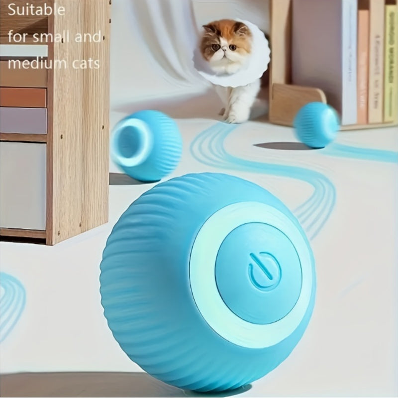 PounceBall smart cat toy in bright blue with textured surface and LED ring, shown rolling on floor with curious cat watching