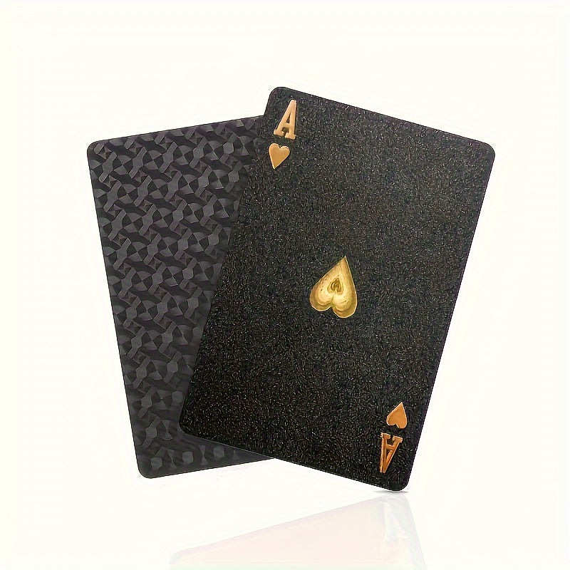 PrestigeDeck black playing cards with gold Ace of Spades and patterned back design displayed on white surface