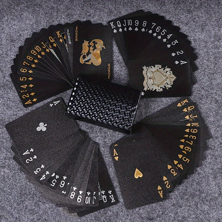 PrestigeDeck luxury playing cards fanned out in black and gold design with ornate face cards and textured back pattern