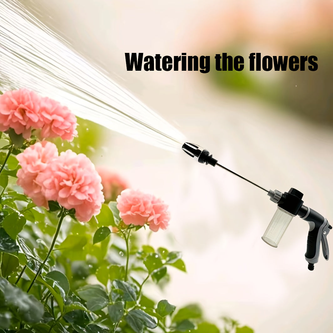 ProClean High-Pressure Car Wash Gun spraying water stream at pink flowers, demonstrating adjustable spray pattern and soap dispenser