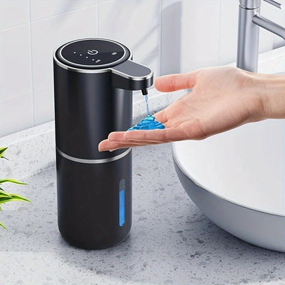 PureTouch automatic soap dispenser in matte black dispensing blue liquid soap over bathroom sink with touch-free sensor