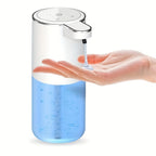 PureTouch automatic soap dispenser in white dispensing blue liquid soap into an open palm - touchless bathroom hygiene