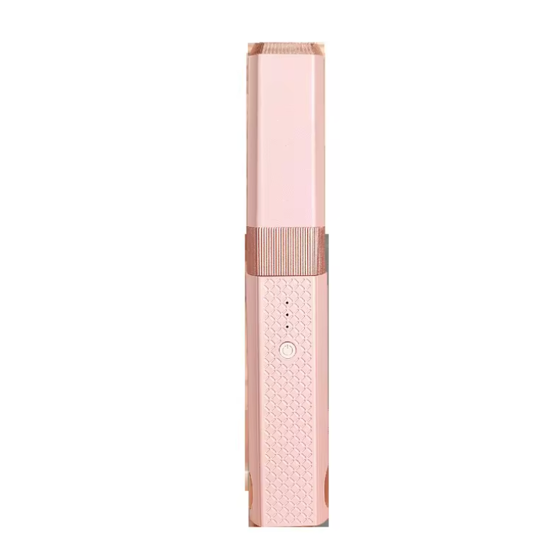 QuickStyle Pro portable wireless hair straightener in rose gold with textured grip and temperature control display