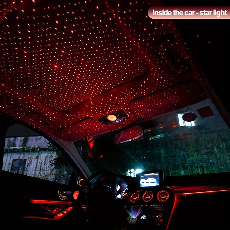 Red starlight projection from HighPeak 4-in-1 car charger illuminating vehicle ceiling with ambient galaxy effect in dark interior