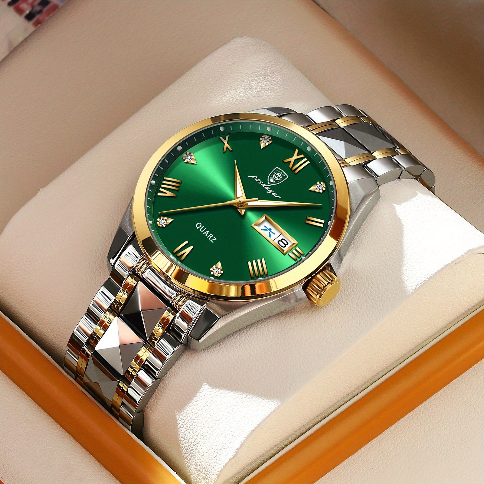 RegalTime luxury quartz watch with emerald green dial, two-tone gold and silver bracelet, displayed in presentation box