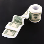 RichRoll novelty toilet paper featuring $100 bill print design unrolling on black background, showing embossed money pattern