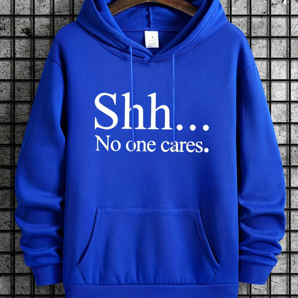 Royal blue SHH No One Cares hoodie with white text print and kangaroo pocket displayed on hanger against grid background