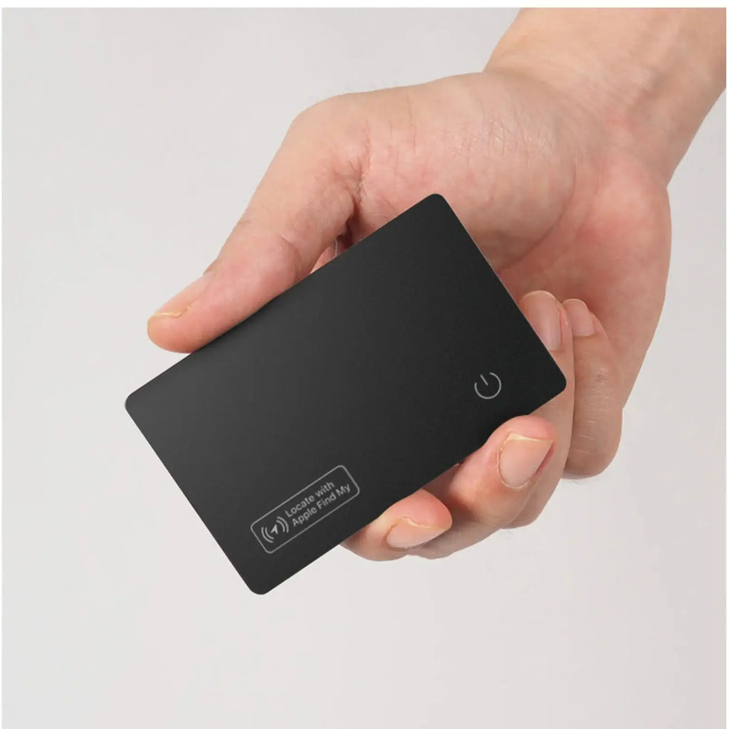 HighPeak Smart Tracker Card in black held in hand showing slim design and Apple Find My compatibility icon.