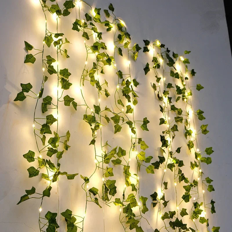 GlowVine Lights by HighPeak glowing warm ivy LED vines draped on white wall for cozy ambient decor