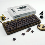 HighPeak Dark Walnut Keycap Set on a wooden keyboard frame with artisan wood texture, surrounded by mini decor on white surface