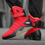 NeoVolt Sneakers in red with black speckled sole and adjustable ankle strap, showcasing futuristic streetwear style by HighPeak