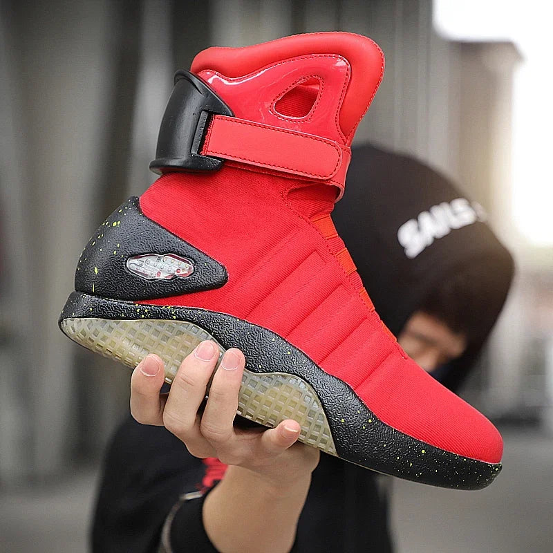 NeoVolt Sneakers in bold red with black speckled sole and futuristic high-top design held by person outdoors HighPeak