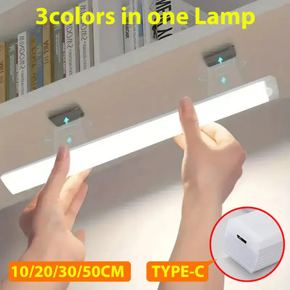 HighPeak Motion Sensor Light being installed under a cabinet with bright white LED strip and Type-C charging port visible