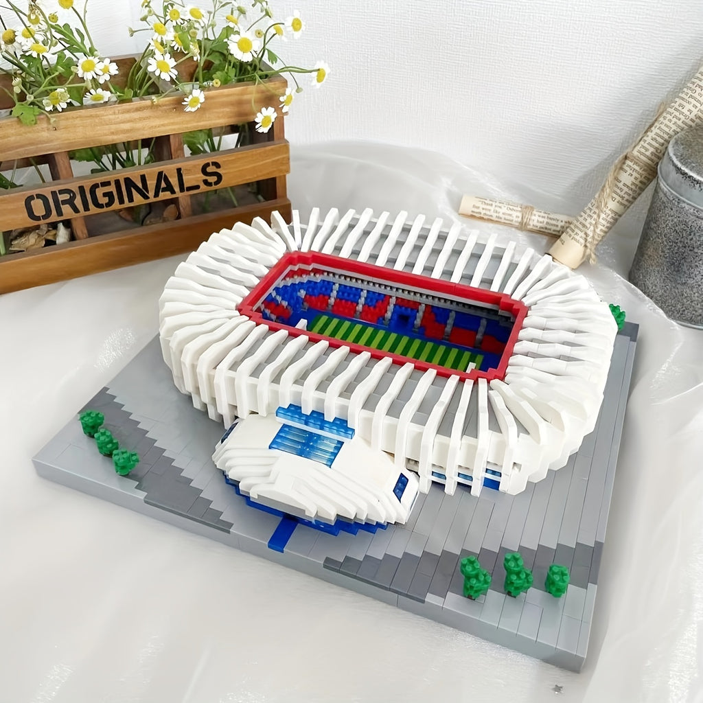 StadiumMaster building set featuring detailed white stadium model with blue and red field, gray base, and green accents