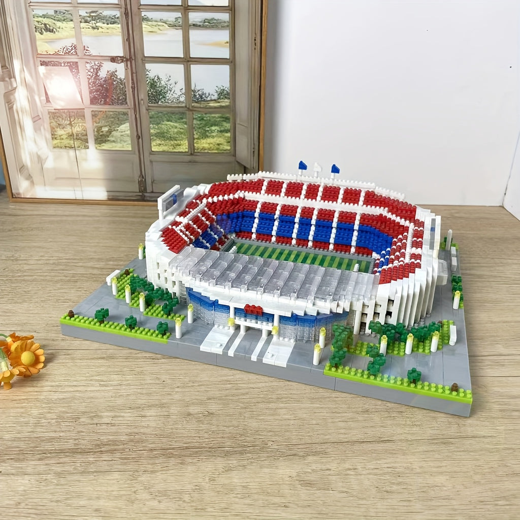 StadiumMaster football stadium building set displayed on wooden floor near window - detailed 3D model with red and blue seating