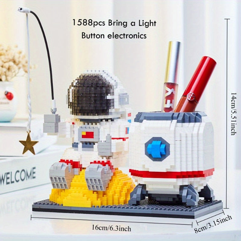 Starlight Voyager astronaut building block set with LED helmet and pen holder on lunar surface display diorama