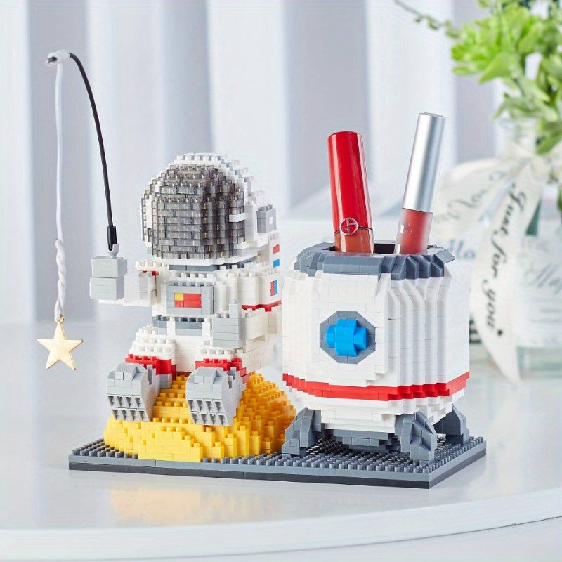 Starlight Voyager astronaut building set with LED helmet and pen holder capsule on lunar surface display - space themed desk decor