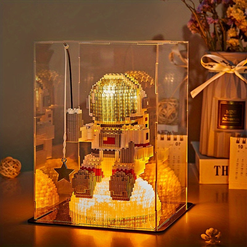 Starlight Voyager illuminated building block astronaut in display case with warm LED glow - desk decor and storage solution