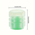 TireValve glow-in-the-dark tire valve cap in translucent green with ribbed design, showing size measurements and luminescent effect