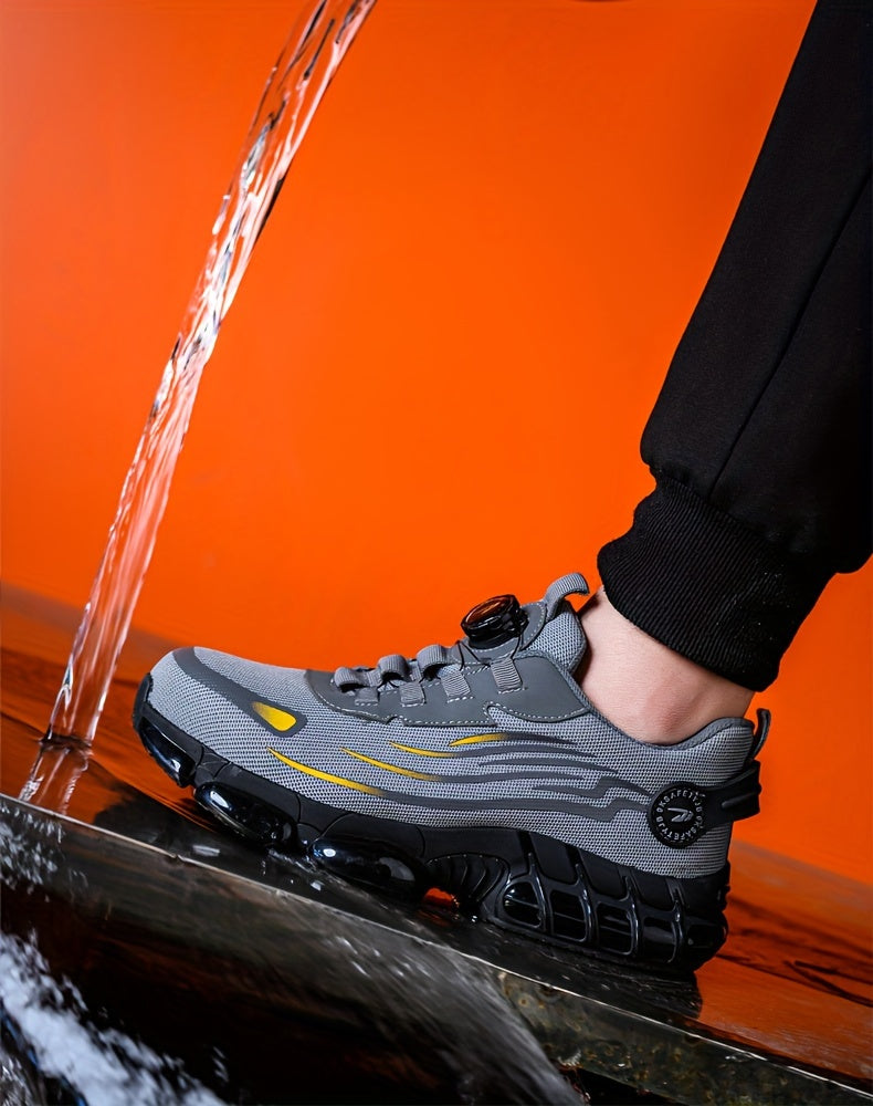 TitanStep Shoes in gray with dial-fit system and steel toe cap showcased in water-resistant demonstration against orange backdrop