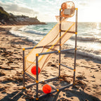 Ultimate Indoor/Outdoor Basketball Hoop Set with mesh ramp and adjustable frame on sandy beach at sunset, orange basketballs