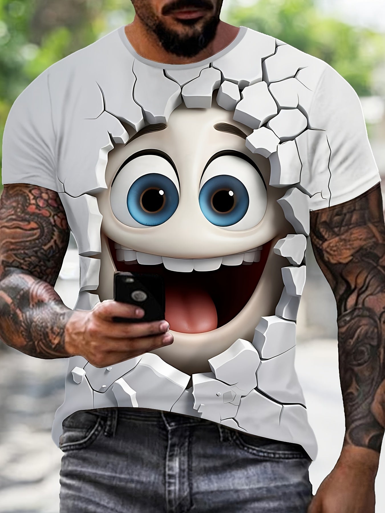 White 3D Crack Face T-shirt featuring cartoon character bursting through cracked wall design with blue eyes and cheerful smile