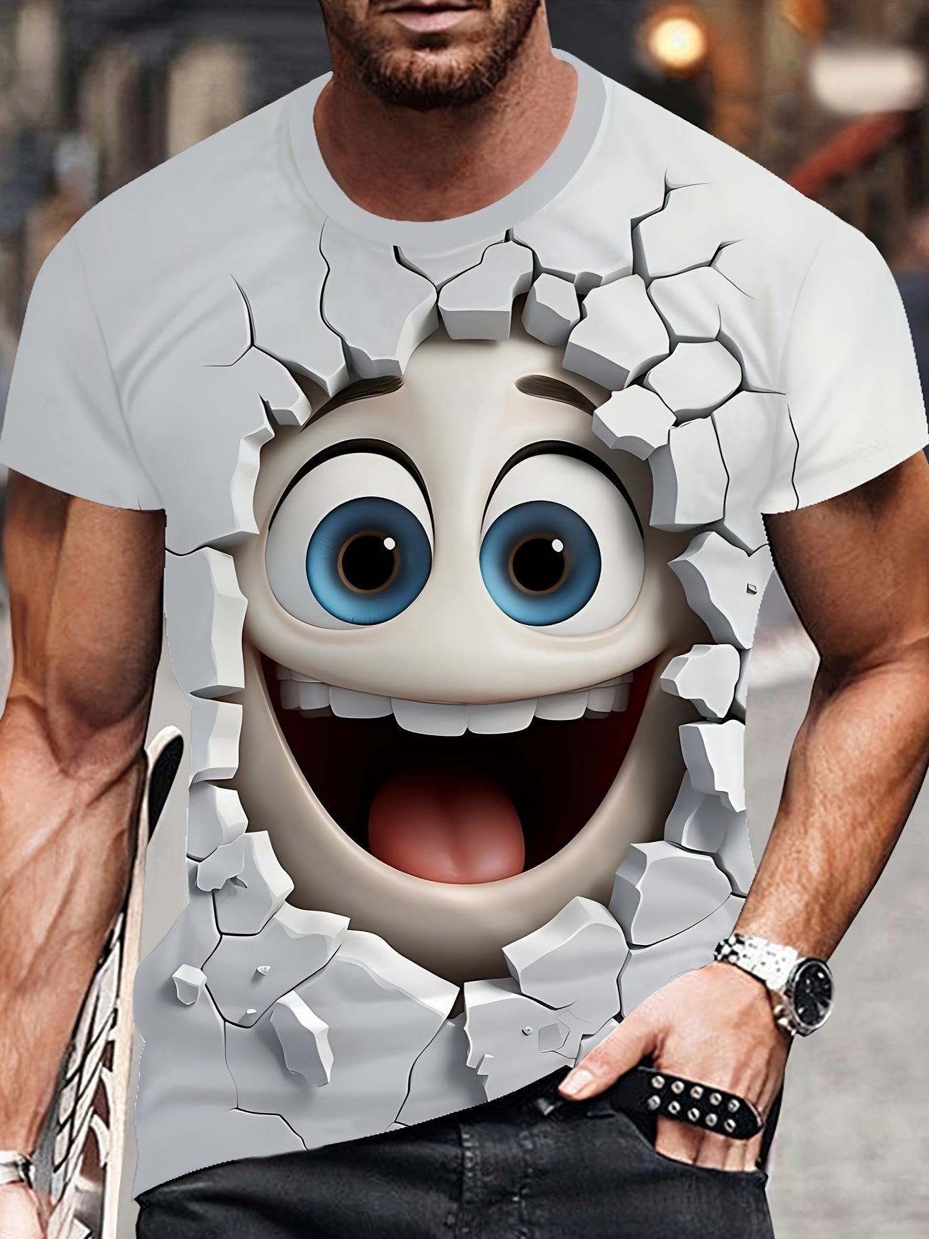 White 3D Crack Face T-shirt featuring playful cartoon face breaking through cracked wall illusion, with blue eyes and wide smile