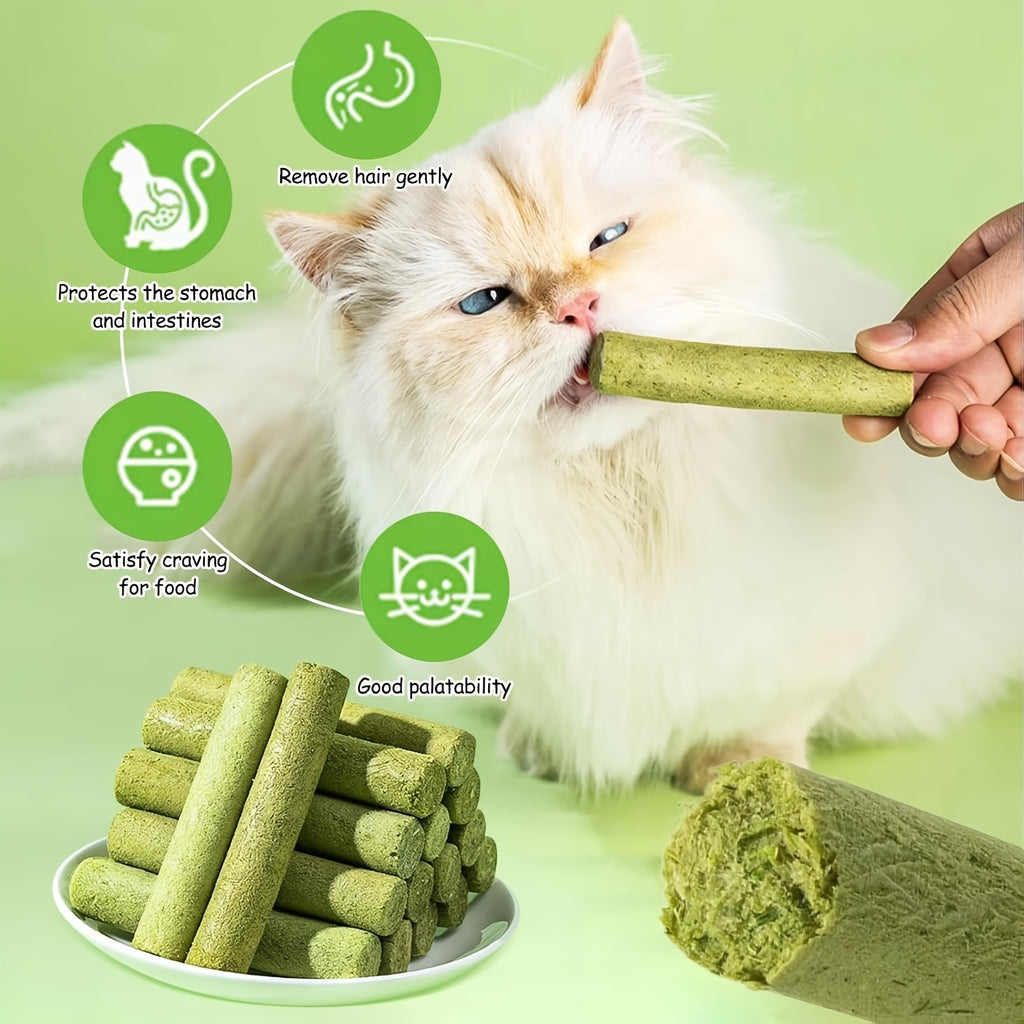 White Persian cat biting natural green cat grass chew stick with product benefits shown - Purrfectly Natural digestive aid treat