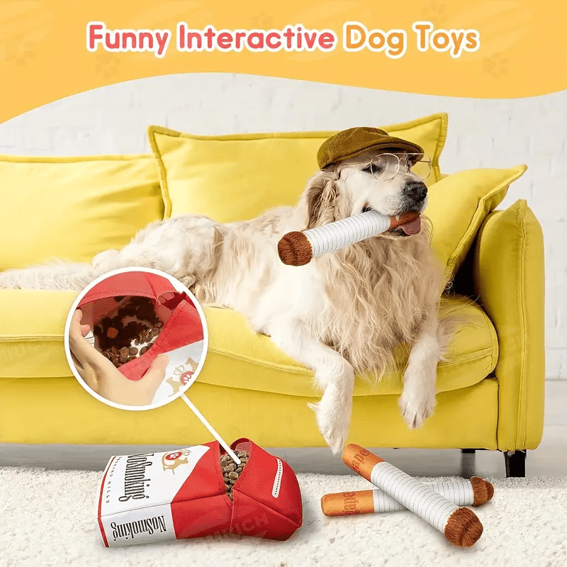 White dog with HighPeak HoundSmokes plush toy on yellow sofa - funny cigarette-themed dog chew toy with red pack