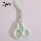 BrowCraft™ Eyebrow Trimming Scissors in mint green with built-in comb for precise, salon-quality brow shaping by HighPeak