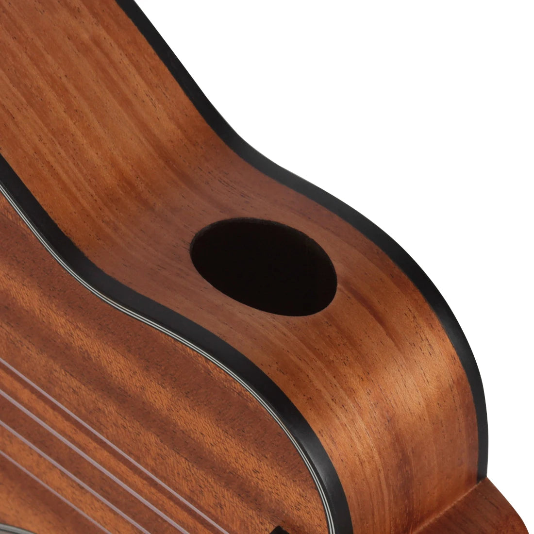 Acoustic Four-String Ukulele angled close-up of the warm brown side sound port and dark edge binding.