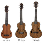 Acoustic Four-String Ukulele front comparison of the 21, 23 and 26 Inch options on white.
