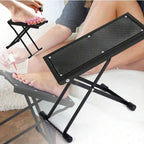 Adjustable Pedicure Foot Rest shown supporting a foot during an at-home toenail painting session
