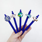 Airplane Ballpoint Pen Set detail showing five pens with globe and airliner patches
