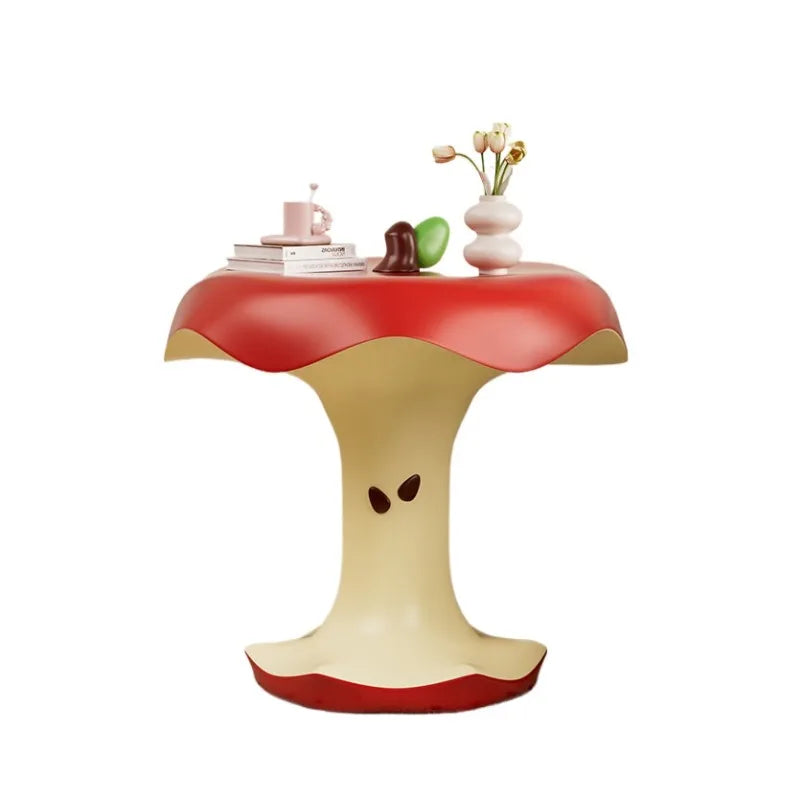 Apple Bite Side Table with books and flowers shown against a white background