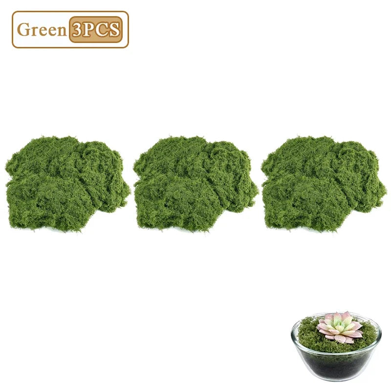 Artificial Decorative Moss 3-pack illustration showing three green moss portions and a small planter styling example.