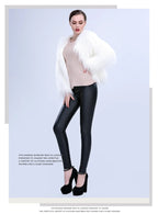 Aurora LED Faux-Fur Coat full-body styling view showing the white faux fur with the lights switched off