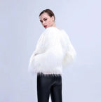 Aurora LED Faux-Fur Coat shown from the back with its full white faux-fur texture and sleeves visible
