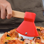 Axe Pizza Slice Cutter red wheel cutting through pizza while a hand holds the bamboo handle.