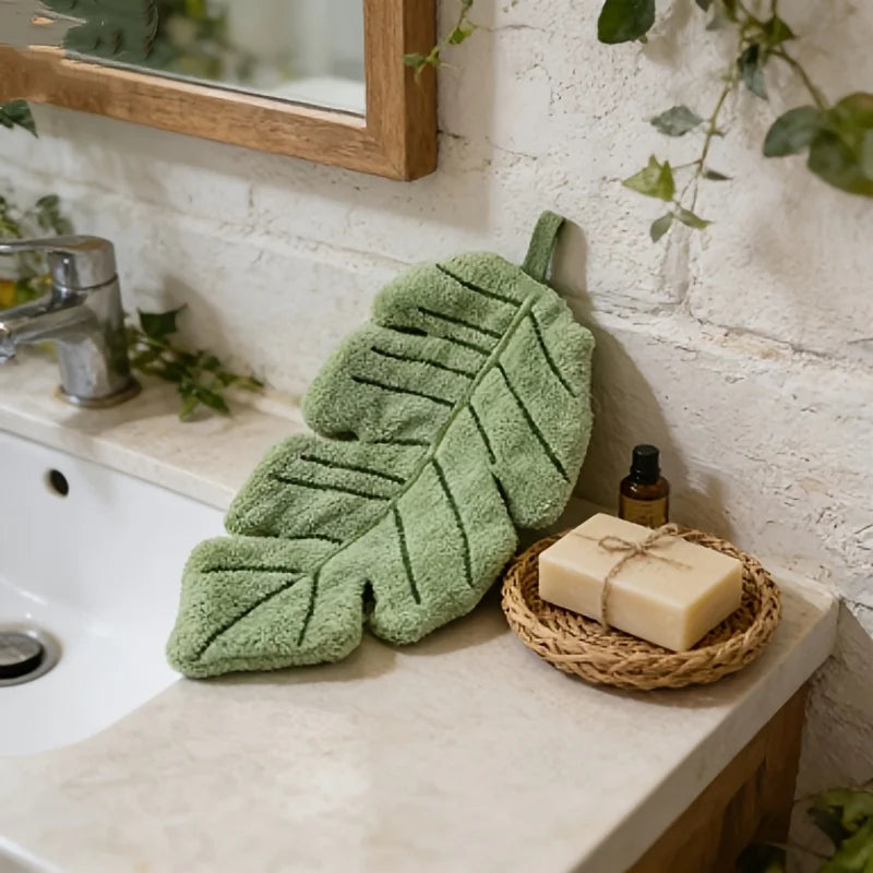 Banana Leaf Hand Towels beside a bathroom sink with soap