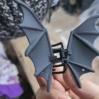 Bat Wing Claw Clip close-up showing the spring hinge and raised details on the black wings.