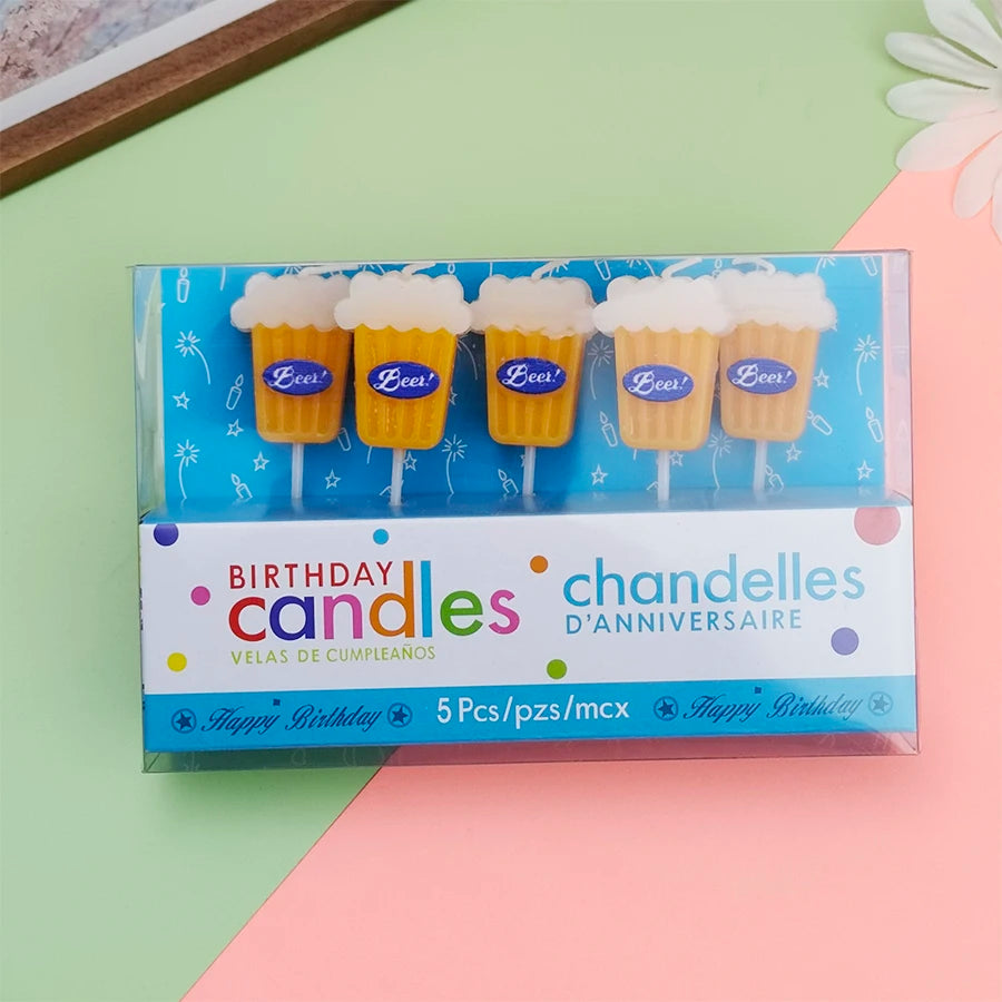 Beer Birthday Candles in a clear-front retail pack containing five yellow beer-glass candles with white foam tops.