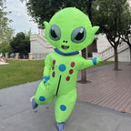Big-Head Inflatable Alien Costume posing on one leg outdoors, with the mouth viewing panel visible.