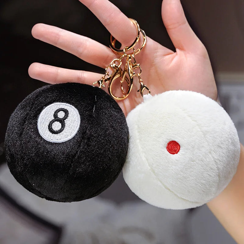 Billiard Ball Plush Set small black 8 ball and white cue ball pendants with gold-tone keyring clips.