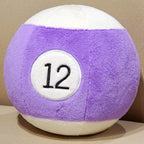 Billiard Ball Plush Set purple striped number 12 ball resting on a beige seat.