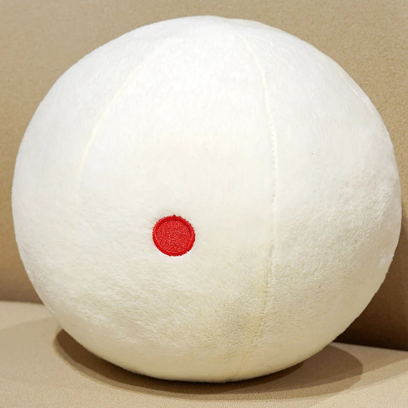 Billiard Ball Plush Set white cue ball with a red dot resting on a beige seat.