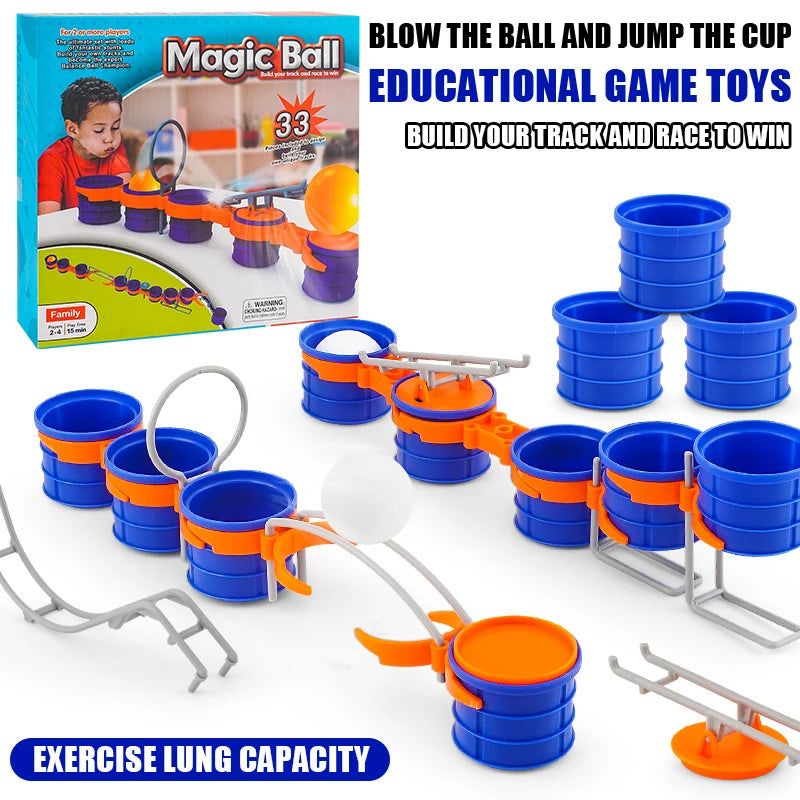 Blow Ball Race Game blue cups, orange connectors, gray obstacles, white balls, and retail box